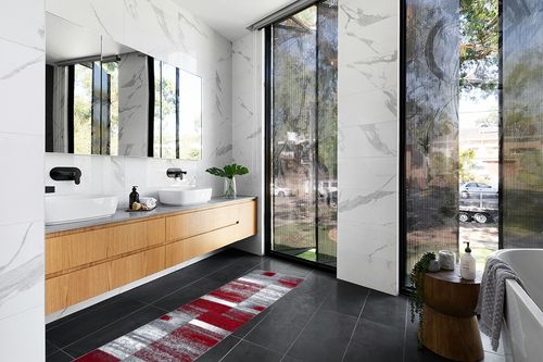 Art Deco Abstract Geometric Area Rug in Modern Black Tiled bathroom