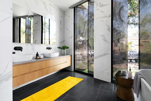 Yellow, 2 x 6 Feet fluffy rug in Modern Black Tiled bathroom