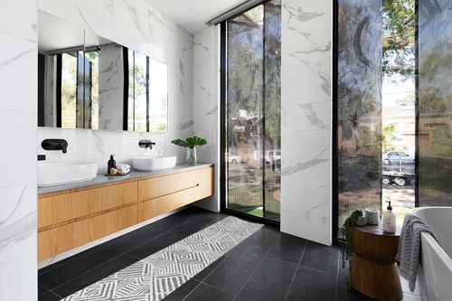 Jordan High-Low Pile Art Deco Geometric Indoor Outdoor Area-Rug in Modern Black Tiled bathroom