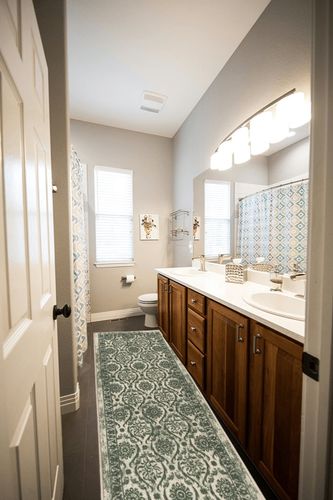 Antep Rugs Alfombras in Wooden and Grey Bathroom