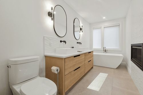 SAFAVIEH Adirondack Collection Area Rug - 9' x 12', Green & Ivory, Modern Diamond Distressed Design, Non-Shedding & Easy Care, Ideal for High Traffic Areas in Living Room, Bedroom (ADR131Y) in Scandinavian Neutral bathroom