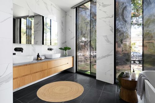 Ramanta Home Jute Braided Rug, 4' Round Natural, Hand Woven Reversible Rugs for Kitchen Living Room Entryway, 4 Feet Round in Modern Black Tiled bathroom