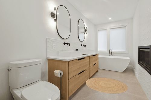 Ramanta Home Jute Braided Rug, 4' Round Natural, Hand Woven Reversible Rugs for Kitchen Living Room Entryway, 4 Feet Round in Scandinavian Neutral bathroom