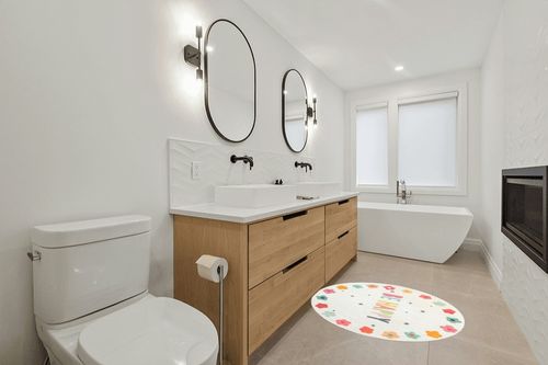 Poowe Round Kids Playroom Rug - Soft Alphabet Nursery Rug for Bedroom - Playtime Collection, Learning & Game Carpet for Classroom, Best Shower Gift for Infant Toddlers (Round 39.4", Flower-Happy) in Scandinavian Neutral bathroom