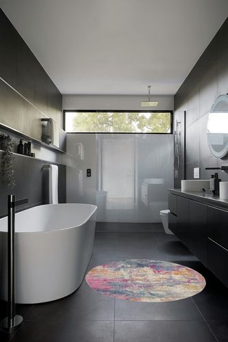 HomeRoots 4' Blue and Pink Round Abstract Power Loom Area Rug in Black Modern Bathroom