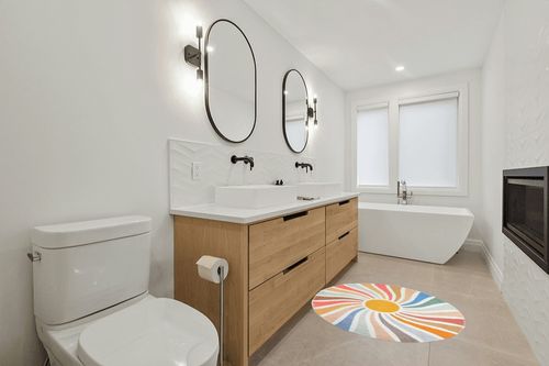 Topotdor Sun Rainbow Round Rug,Colorful Boho Kids Rug Ultra Soft Washable Nursery Rug for Bedroom Perschool Classroom,47" Round in Scandinavian Neutral bathroom