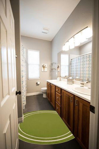 Nourison Essentials Indoor/Outdoor Solid Bordered Green Ivory 4' x Round Area Rug, Easy Cleaning, Non Shedding, Bed Room, Living Room, Dining Room, Backyard, Deck, Patio (4 Round) in Wooden and Grey Bathroom