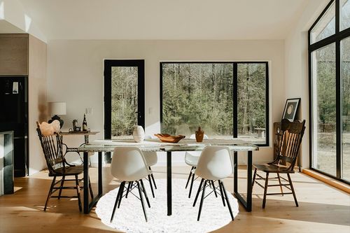 White 6 Ft Round  Shag Rug in Modern Scandinavian Dining Room with Black Accents