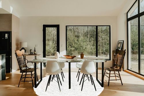 White 7 Ft Round  Shag Rug in Modern Scandinavian Dining Room with Black Accents