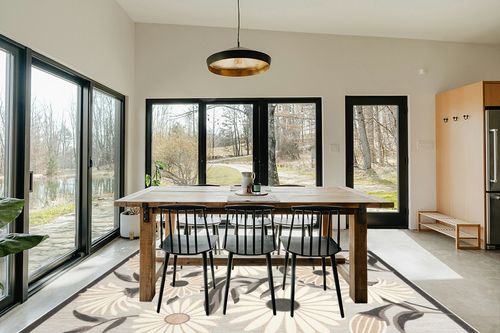 Nourison Aloha Indoor/Outdoor Beige 7' x 10' Area -Rug, Easy -Cleaning, Non Shedding, Bed Room, Living Room, Dining Room, Deck, Backyard, Patio, High Traffic (7x10) in Scandinavian Dining Room with Rectangular Table