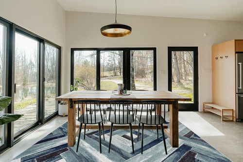 LUXE WEAVERS Modern Abstract Wood Carpet Geometric Blue 8x10 Area Rug in Scandinavian Dining Room with Rectangular Table