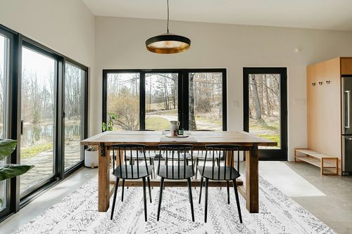 8x10 Large Moroccan Soft Fluffy Geometric Washable Bedroom Rugs in Scandinavian Dining Room with Rectangular Table