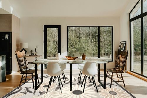 Nourison Aloha Indoor/Outdoor Beige 7' x 10' Area -Rug, Easy -Cleaning, Non Shedding, Bed Room, Living Room, Dining Room, Deck, Backyard, Patio, High Traffic (7x10) in Modern Scandinavian Dining Room with Black Accents