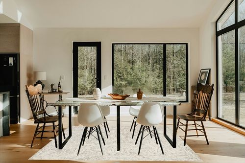 Loloi II Ziva Collection ZV-01 Neutral 5'-0" x 7'-6" Area Rug in Modern Scandinavian Dining Room with Black Accents