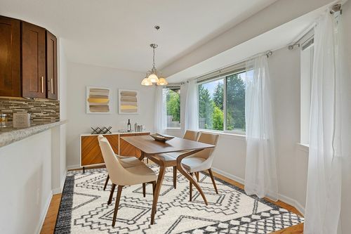 JONATHAN Y MOH200A-8 Amir Moroccan Beni Souk Indoor Area-Rug Bohemian Farmhouse Rustic Geometric Easy-Cleaning Bedroom Kitchen Living Room Non Shedding, 8 X 10, Cream,Black in Modern White Dining Room with Wooden Accents