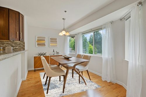 Area Rug Living Room Rugs - 5x7 Abstract Large Soft Indoor Washable Rug Neutral Modern Low Pile Carpet for Bedroom Dining Room Farmhouse Home Office - Beige Blue in Modern White Dining Room with Wooden Accents