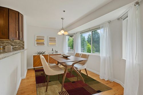 Mohawk Home Alliance Modern Geometric 6' x 9' Area Rug - Red - Perfect for Living Room, Dining Room, Office in Modern White Dining Room with Wooden Accents