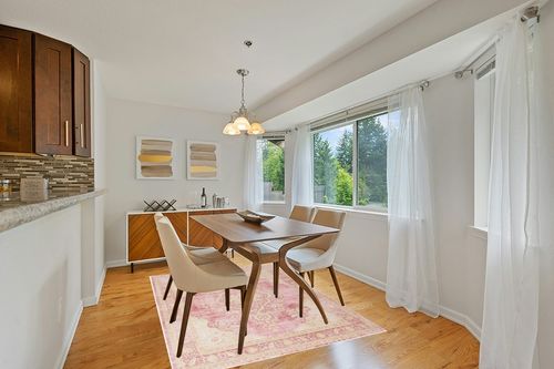 Momeni Rugs Isabella Traditional Medallion Flat Weave Area Rug, 5'3" X 7'3", Pink in Modern White Dining Room with Wooden Accents