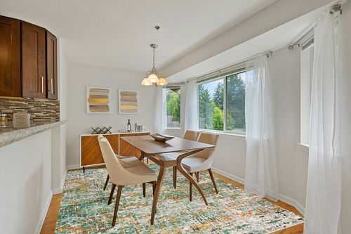Green/Turquoise Contemporary Shed Resistant, Stain Resistant Living Room Area Rug in Modern White Dining Room with Wooden Accents