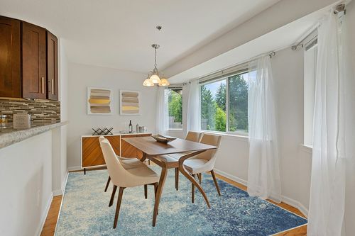 Nourison Passion Navy/Light Blue 8' x 10' Area -Rug, Modern, Abstract, Easy -Cleaning, Non Shedding, Bed Room, Living Room, Dining Room, Kitchen (8x10) in Modern White Dining Room with Wooden Accents