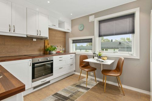 HomeRoots 8' Beige Charcoal Brown Grey Tan Gold and Blue Geometric Power Loom Runner Rug with Fringe in Wood and White Small Kitchen