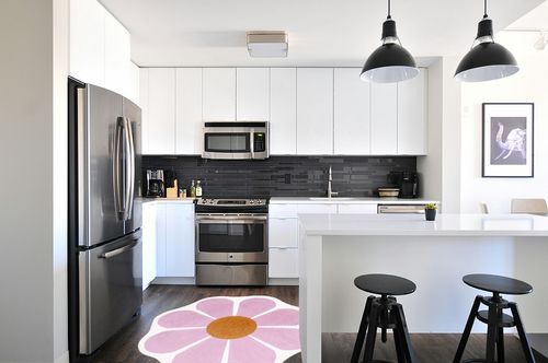 USTIDE Pink Flower Shaped Rug 47x47 Inch, Washable Flower Shaped Rug Soft Flower Rugs for Bedroom in White and Black Modern Kitchen