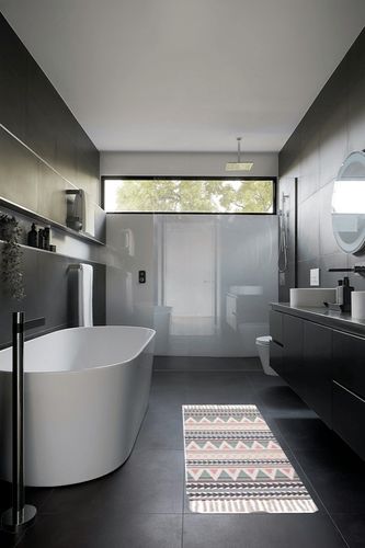 Poowe Cotton Woven Tassles Area Rug in Black Modern Bathroom