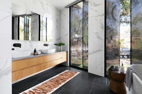 SAFAVIEH Studio Leather Collection 2'3" x 7' Ivory / Brown STL814A Handmade Mid-Century Modern Leather Runner Rug in Modern Black Tiled bathroom