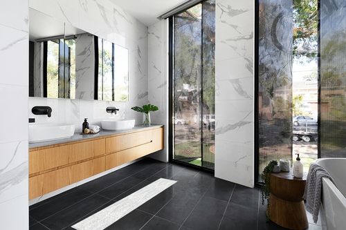 SAFAVIEH Capri Collection Area Rug - 9' x 12', Ivory & Blue, Handmade Wool, Ideal for High Traffic Areas in Living Room, Bedroom (CPR208A) in Modern Black Tiled bathroom