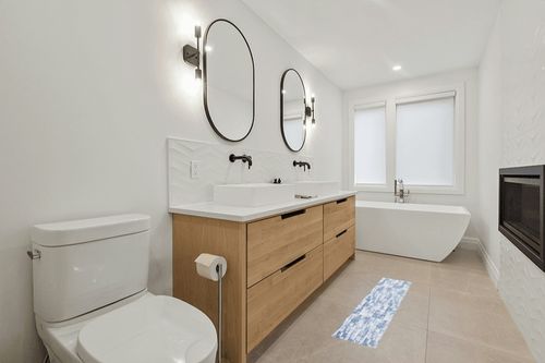 SAFAVIEH Amelia Collection Area Rug - 9' x 12', Ivory & Blue, Modern Abstract Distressed Design, Non-Shedding & Easy Care, Ideal for High Traffic Areas in Living Room, Bedroom (ALA786A) in Scandinavian Neutral bathroom