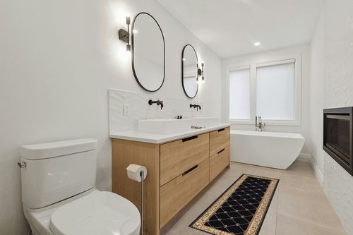 Orleans Traditional Border Black Runner Rug, 2' x 7' in Scandinavian Neutral bathroom