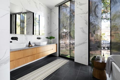 Garland Rug Carnival Stripe 2 Ft. x 8 Ft. Earth Tone Runner Rug in Modern Black Tiled bathroom