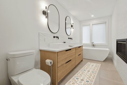 ECOMUSEN Boho Runner Rug for Hallway Living Room Entryway Bedroom Kitchen Laundry Room,Non-Slip Low-Pile Floor Long Area Rug for Hardwood Floors,Washable Faux Wool Carpet (Cream, 2'x8') in Scandinavian Neutral bathroom