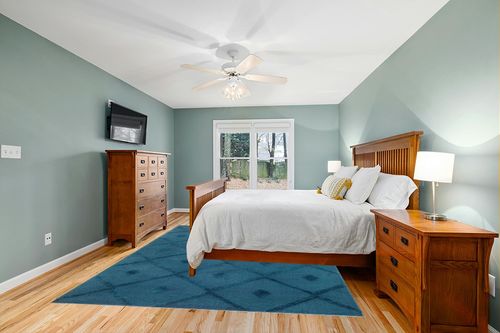 Antep Rugs Palafito 8x10 Geometric Shag Diamond High-Low Pile Textured Indoor Area Rug (Teal Blue, 7'10" x 10') in Teal and Orange Wood Bedroom