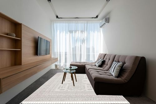 Well Woven Loop-De-Loop Carina Tribal Medallion Beige Kilim-Style 7'10" x 10'6" Area Rug in Grey Living Room with Brown Couch