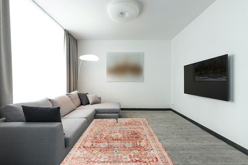 Loloi Claire Red/Ivory 5'-3" x 7'-9" Area Rug in Modern Living Room with Grey Couch