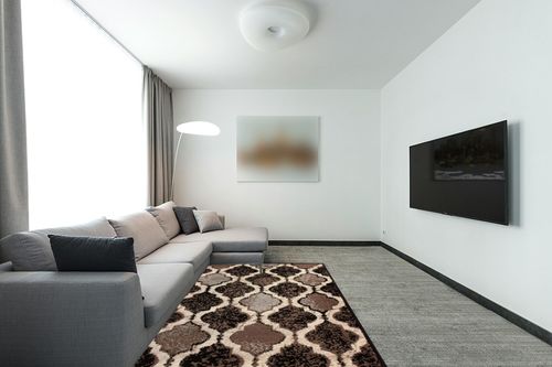 Superior Indoor Large Area Rug, Jute Backed, Perfect for Living/Dining Room, Bedroom, Office, Kitchen, Entryway, Modern Geometric Trellis Floor Decor, Viking Collection, 5' x 8', Chocolate in Modern Living Room with Grey Couch