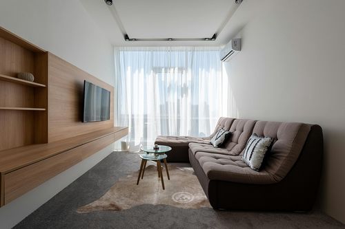 Sunshine Cowhides Genuine Taupe Cowhide Rug - Luxurious Cow Rug for Bedroom, Living Room, and Home Decor Enthusiasts - Masterpiece of Style and Functionality - 6x7-8ft (180x240cm) in Grey Living Room with Brown Couch