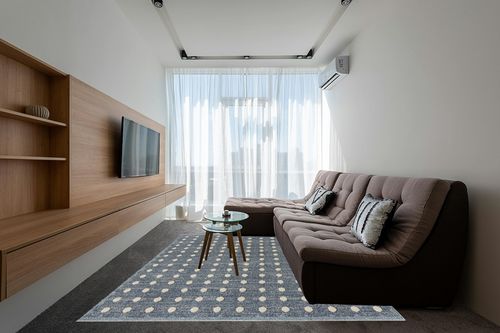 LUXE WEAVERS Modern Geometric Dots Blue 8x10 Area Rug in Grey Living Room with Brown Couch