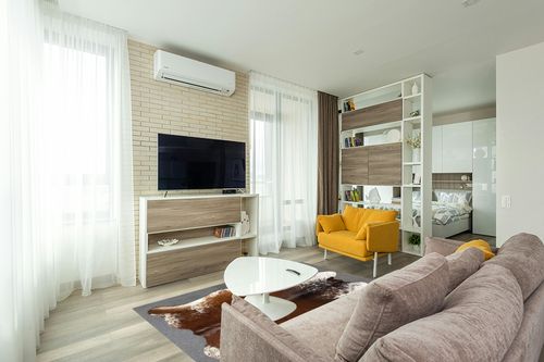 Large Cowhide Rug Tricolor Cowhide Cow Skin Leather Area Rug, Hair On Cow Hide Rugs 5 X 7 ft Black, Brown and White in Light Modern Living Room with TV