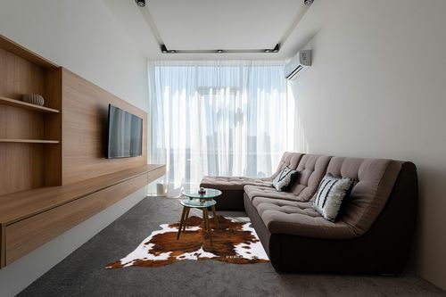 ecowhides 100% Genuine Brazilian Cowhide Rug - Tricolor, Brown, Black & White - Luxury Cowskin Leather Area Rug Decor, (X-Large) 7 x 6 ft in Grey Living Room with Brown Couch