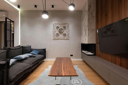 Sunshine Cowhides Genuine Metallic Silver On Off White Cowhide Rug - Luxurious Cow Rug for Bedroom, Living Room, & Home Decor Enthusiasts - Masterpiece of Style & Functionality - 6x8ft (180x240cm) in Dark Wood Living Room with Black Couch