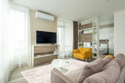 6' x 9' Ivory fluffy rug in Light Modern Living Room with TV