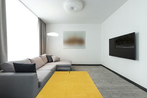 Nourison Essentials Indoor/Outdoor Yellow 5' x 7' Area Rug, Easy -Cleaning, Non Shedding, Bed Room, Living Room, Dining Room, Backyard, Deck, Patio (5x7) in Modern Living Room with Grey Couch