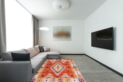 nuLOOM Reda Aztec Bordered Machine Washable Ultra Thin Area Rug, 5' x 8', Burnt Orange in Modern Living Room with Grey Couch