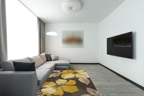 CAMILSON Solana Modern Floral 5x7 Area Rugs Non-Skid (Non-Slip) Rubber Backing Yellow - Brown Flowers Indoor Rug (5 x 7, Yellow Brown) in Modern Living Room with Grey Couch