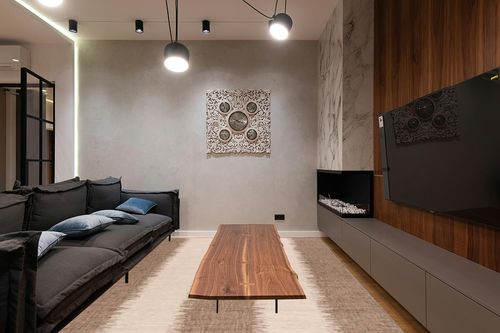 Rectangle Blythe Abstract Machine Woven Polypropylene/Polyester/Latex Indoor ... in Dark Wood Living Room with Black Couch