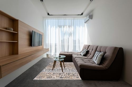 Rugs.com Leipzig Collection Area Rug – 5' x 8' Beige Low-Pile Rug Perfect for Bedrooms, Dining Rooms, Living Rooms in Grey Living Room with Brown Couch