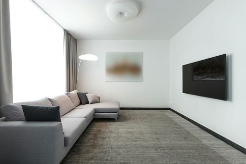 WESTLOOM Living Room Area Rug 9x12 Large Area Rug Indoor Moroccan Area Rug Boho Tribal Fluffy Rug Nursery Rug Contemporary Accent Shag Rug for Living Room Bedroom Nursery, Ivory in Modern Living Room with Grey Couch