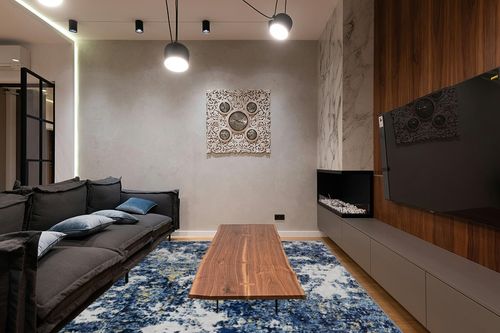 Area Rug 9x12 Living Room: Large Washable Rug with Anti-Slip Backing Non-Shedding Stain-Resistant Soft Abstract Carpet for Bedroom Dining Room Nursery Home Office (Blue/Multi) in Dark Wood Living Room with Black Couch